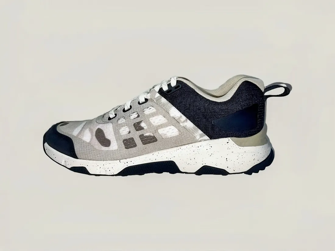 Running shoe with engineered knit upper